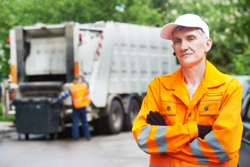 Waste clearance team handling bulky household items in Richmond