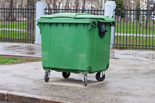 People holding a compliance checklist for ethical waste services