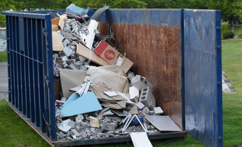 Office clearance team removing furniture in Richmond workspace