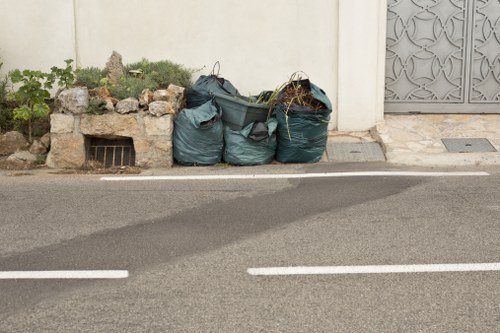 Commercial waste recycling area in Richmond with organized bins
